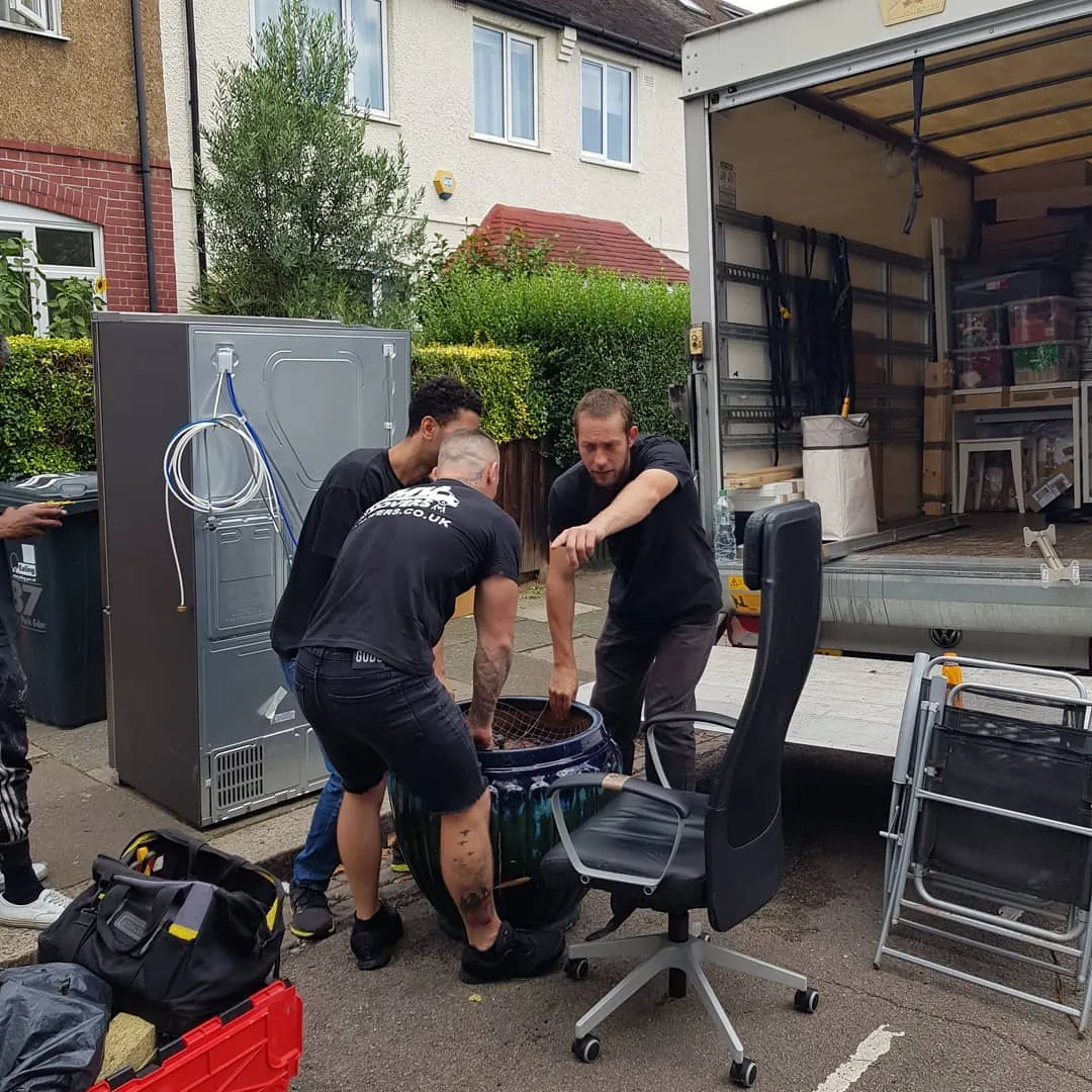 Loading office chairs and a fridge