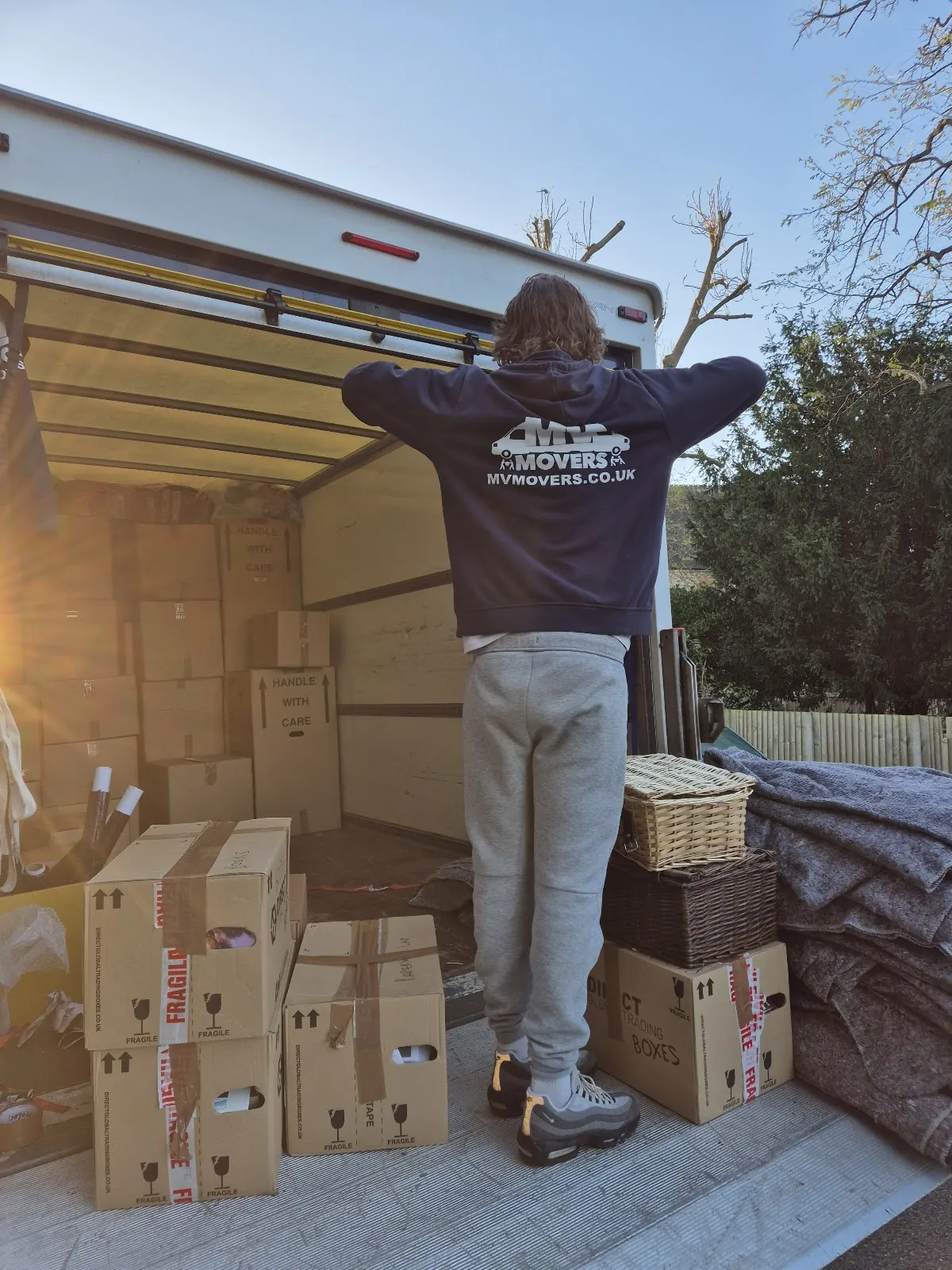 Crew with packed boxes