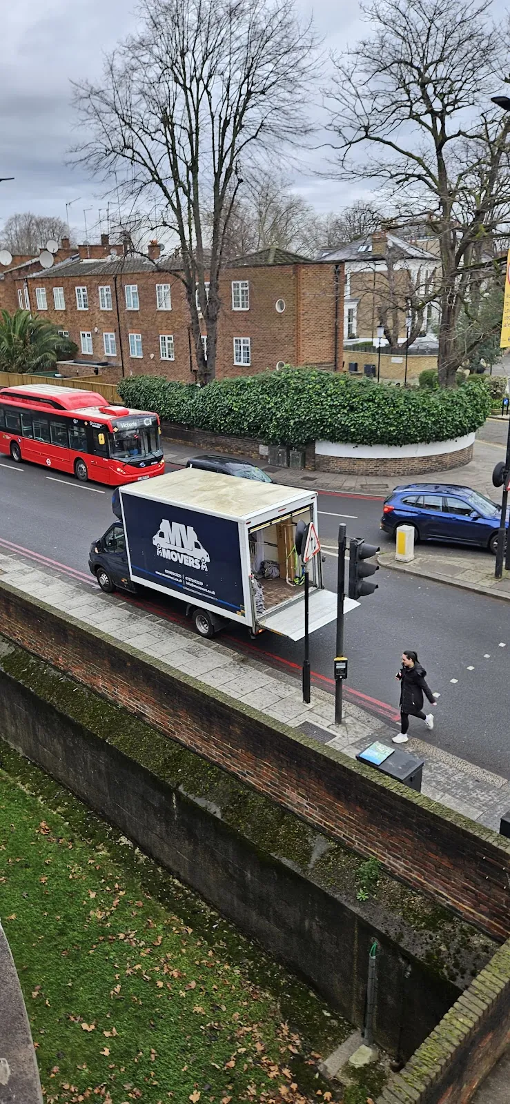 London street – Van and a red bus, a normal Tuesday
